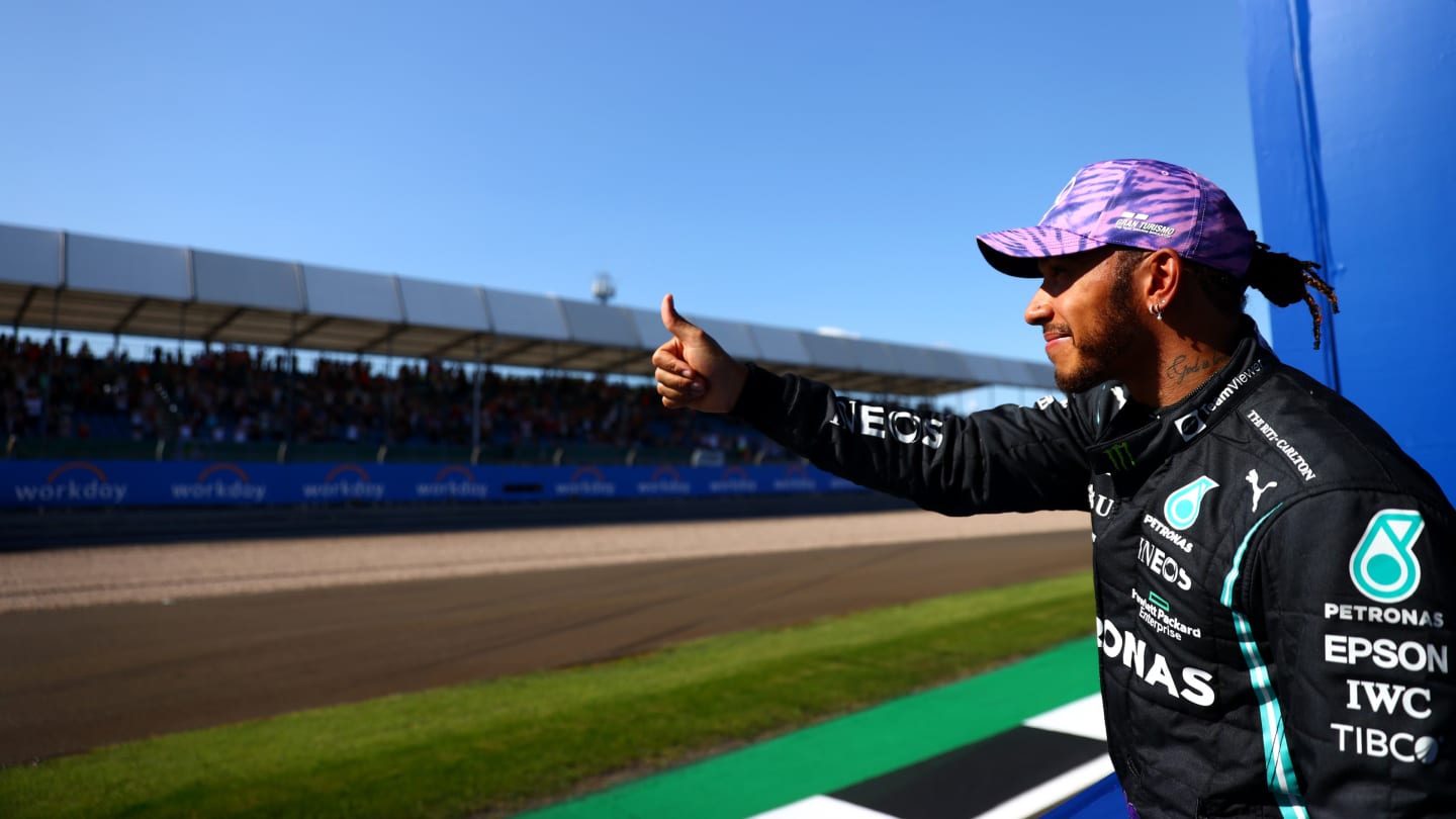 NORTHAMPTON, ENGLAND - JULY 17: Second placed Lewis Hamilton of Great Britain and Mercedes GP waves to the crowd on the Victory Lap during the Sprint for the F1 Grand Prix of Great Britain at Silverstone on July 17, 2021 in Northampton, England. (Photo by Dan Istitene - Formula 1/Formula 1 via Getty Images)
