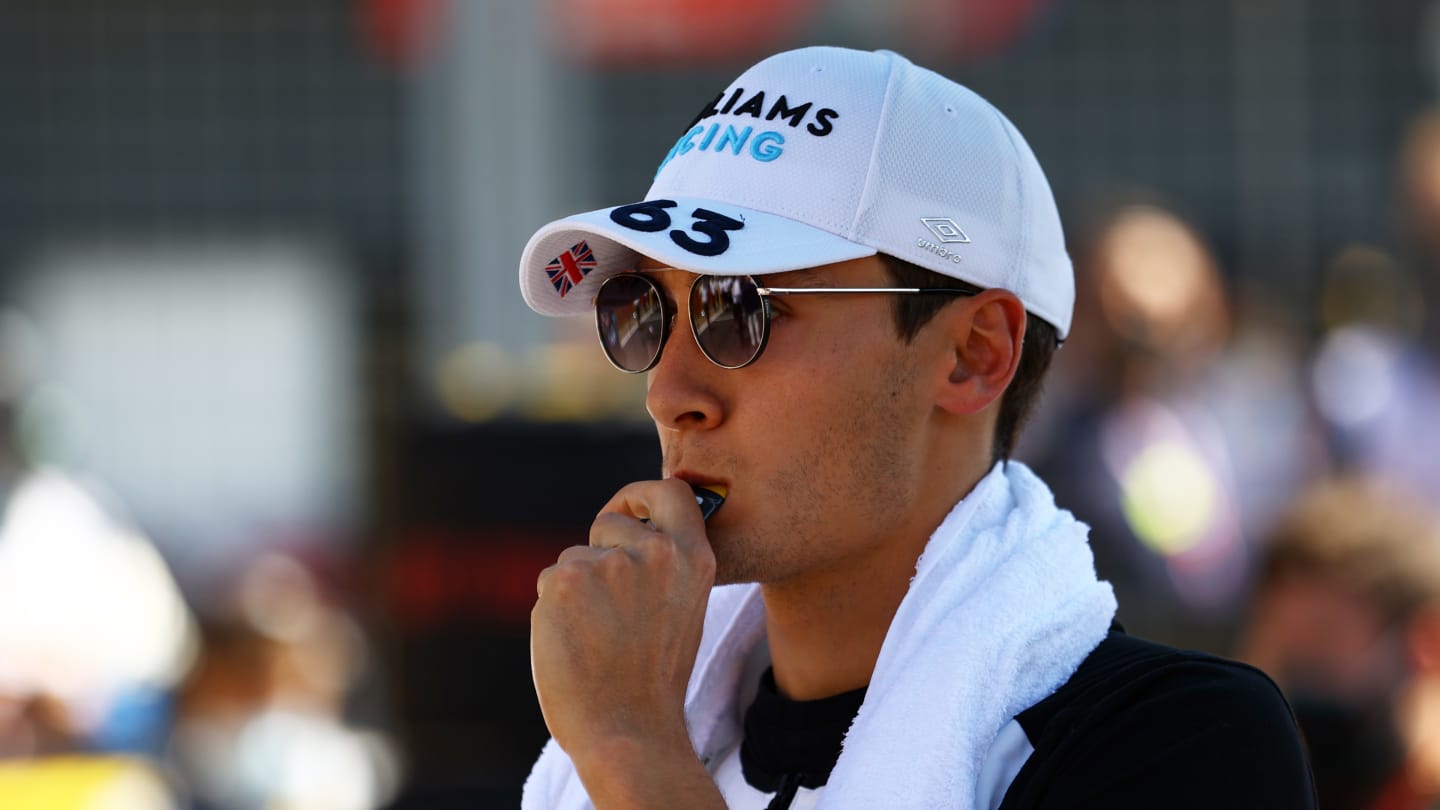 NORTHAMPTON, ENGLAND - JULY 18: George Russell of Great Britain and Williams prepares to drive on the grid  before the F1 Grand Prix of Great Britain at Silverstone on July 18, 2021 in Northampton, England. (Photo by Bryn Lennon - Formula 1/Formula 1 via Getty Images)