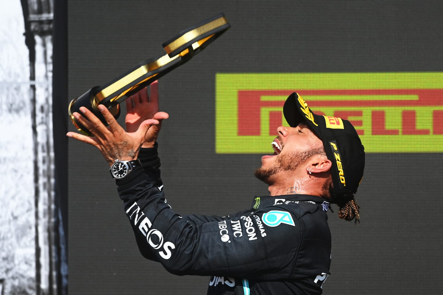 NORTHAMPTON, ENGLAND - JULY 18: Race winner Lewis Hamilton of Great Britain and Mercedes GP celebrates on the podium during the F1 Grand Prix of Great Britain at Silverstone on July 18, 2021 in Northampton, England. (Photo by Michael Regan/Getty Images)