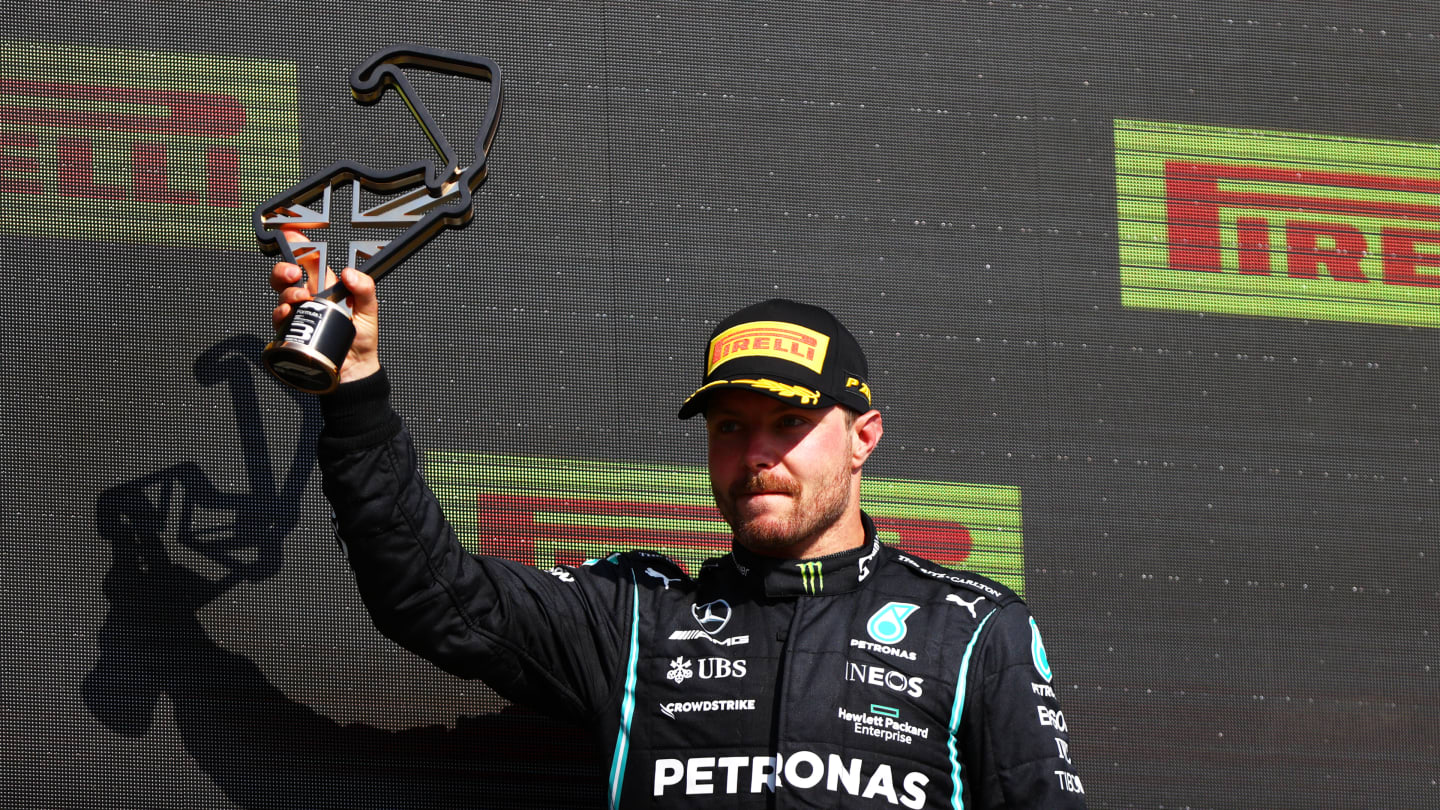NORTHAMPTON, ENGLAND - JULY 18: Third placed Valtteri Bottas of Finland and Mercedes GP celebrates on the podium during the F1 Grand Prix of Great Britain at Silverstone on July 18, 2021 in Northampton, England. (Photo by Dan Istitene - Formula 1/Formula 1 via Getty Images)