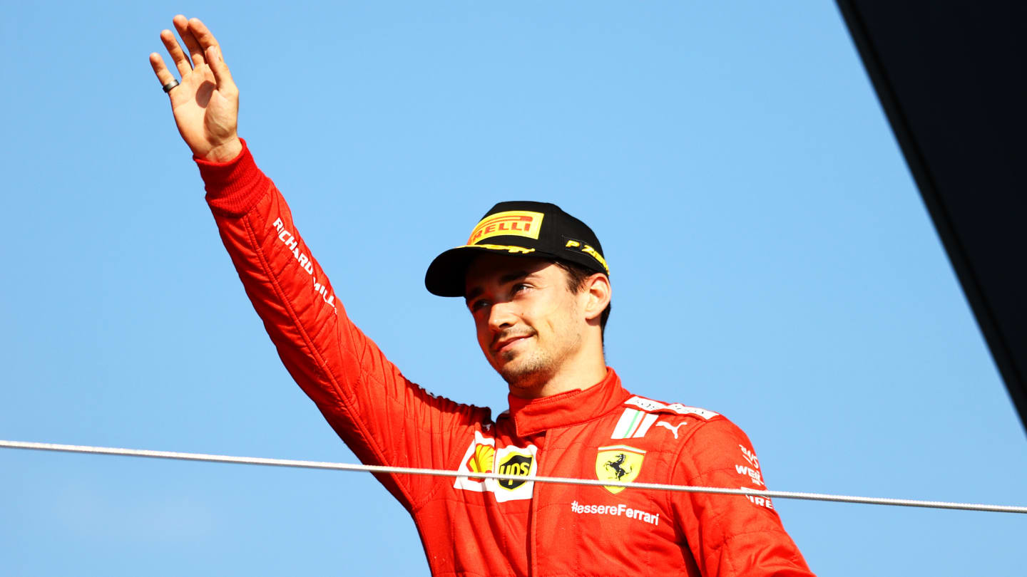 NORTHAMPTON, ENGLAND - JULY 18: Second placed Charles Leclerc of Monaco and Ferrari celebrates on the podium  during the F1 Grand Prix of Great Britain at Silverstone on July 18, 2021 in Northampton, England. (Photo by Bryn Lennon - Formula 1/Formula 1 via Getty Images)