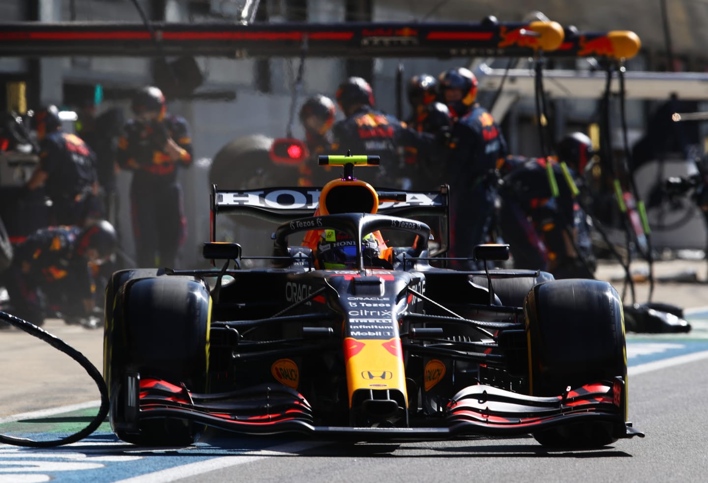 NORTHAMPTON, ENGLAND - JULY 18: Sergio Perez of Mexico driving the (11) Red Bull Racing RB16B Honda