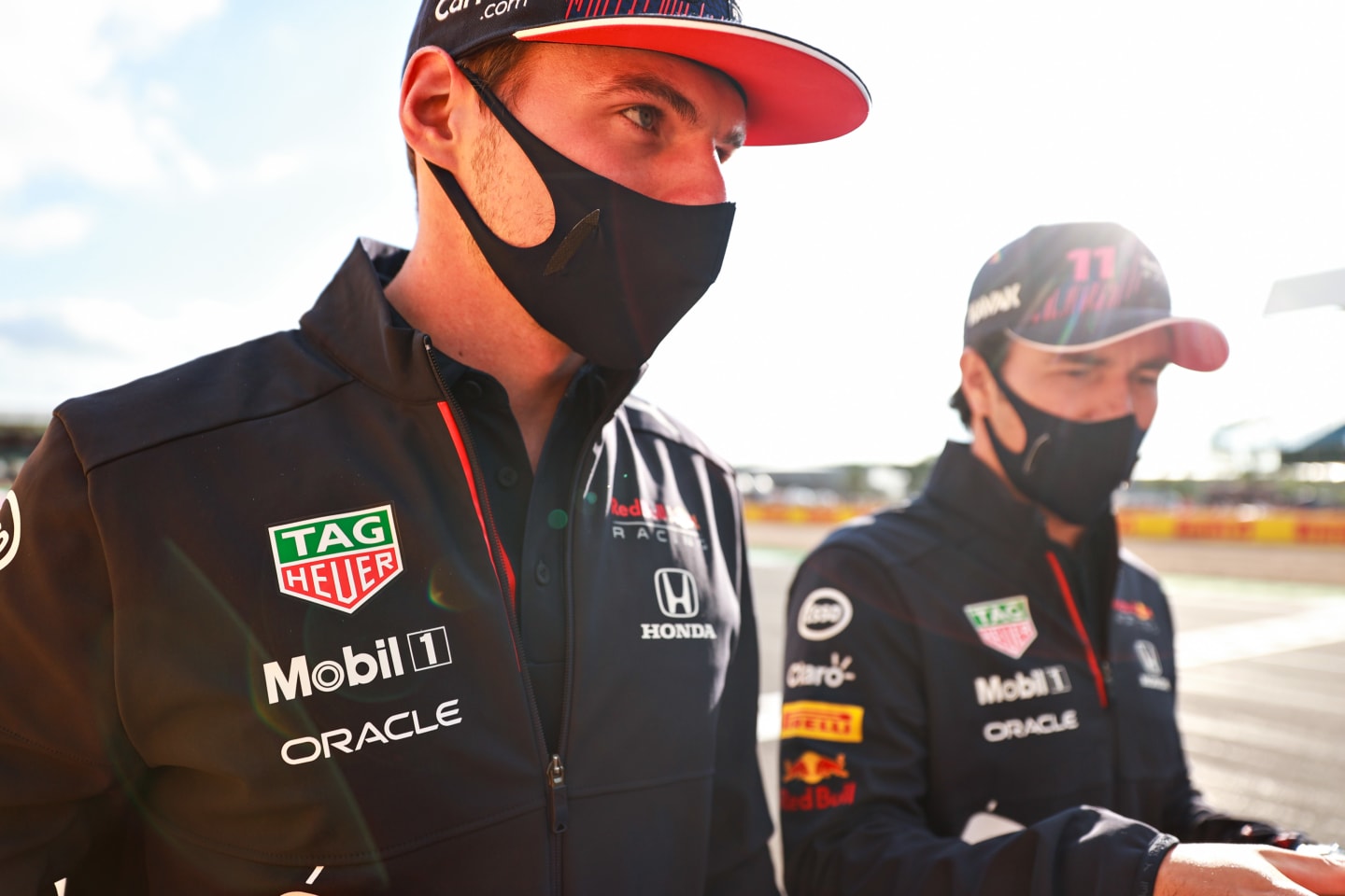 NORTHAMPTON, ENGLAND - JULY 15: Max Verstappen of Netherlands and Red Bull Racing and Sergio Perez