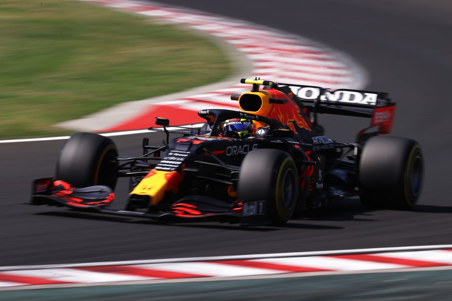 BUDAPEST, HUNGARY - JULY 30: Sergio Perez of Mexico driving the (11) Red Bull Racing RB16B Honda