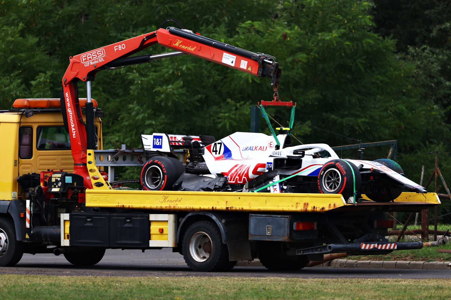 BUDAPEST, HUNGARY - JULY 31: The car of Mick Schumacher of Germany and Haas F1 is removed from the track after a crash during final practice ahead of the F1 Grand Prix of Hungary at Hungaroring on July 31, 2021 in Budapest, Hungary. (Photo by Bryn Lennon/Getty Images)