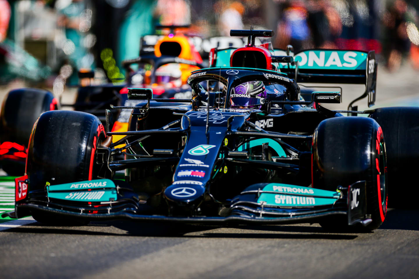 BUDAPEST, HUNGARY - JULY 31: Lewis Hamilton of Mercedes and Great Britain leads Max Verstappen of