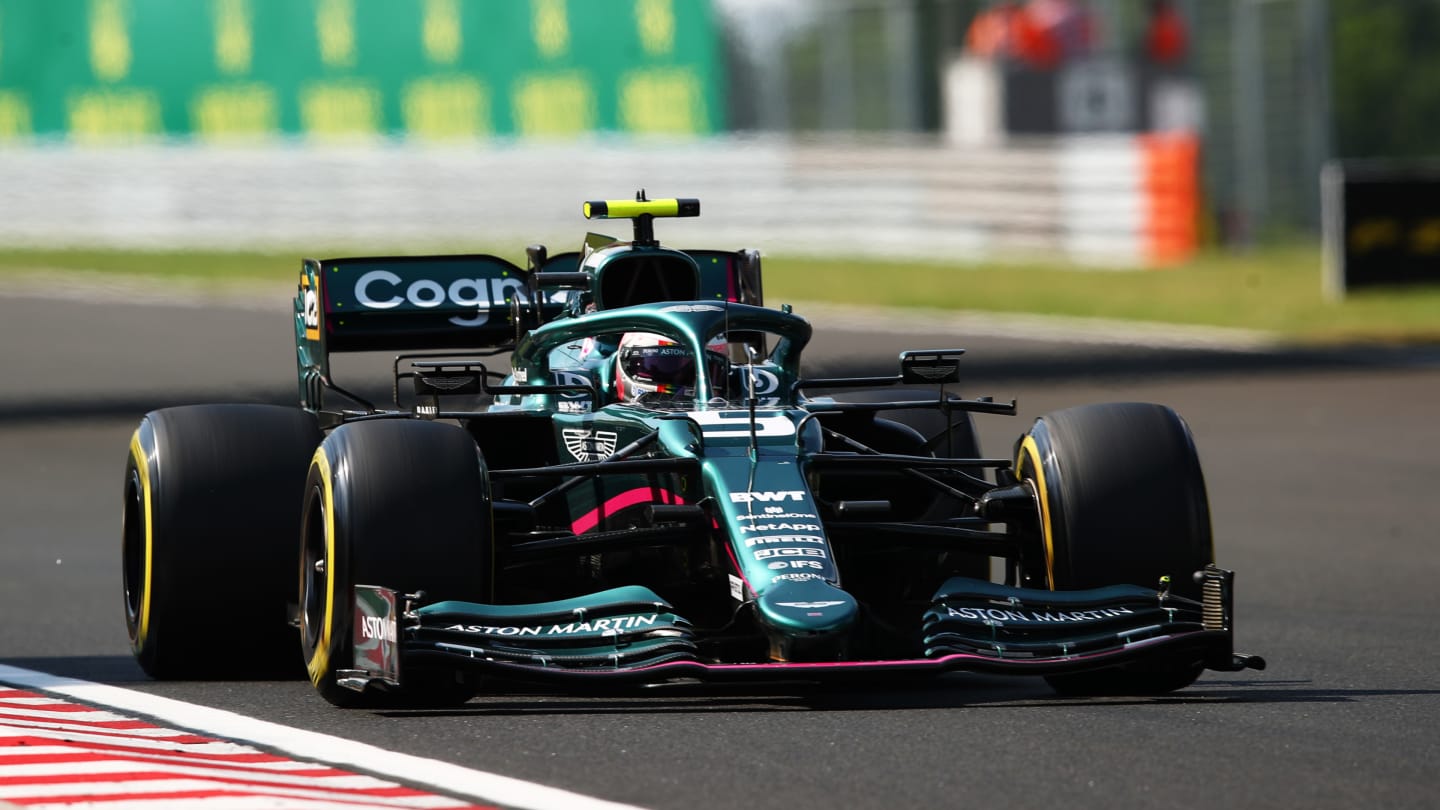 BUDAPEST, HUNGARY - AUGUST 01: Sebastian Vettel of Germany driving the (5) Aston Martin AMR21