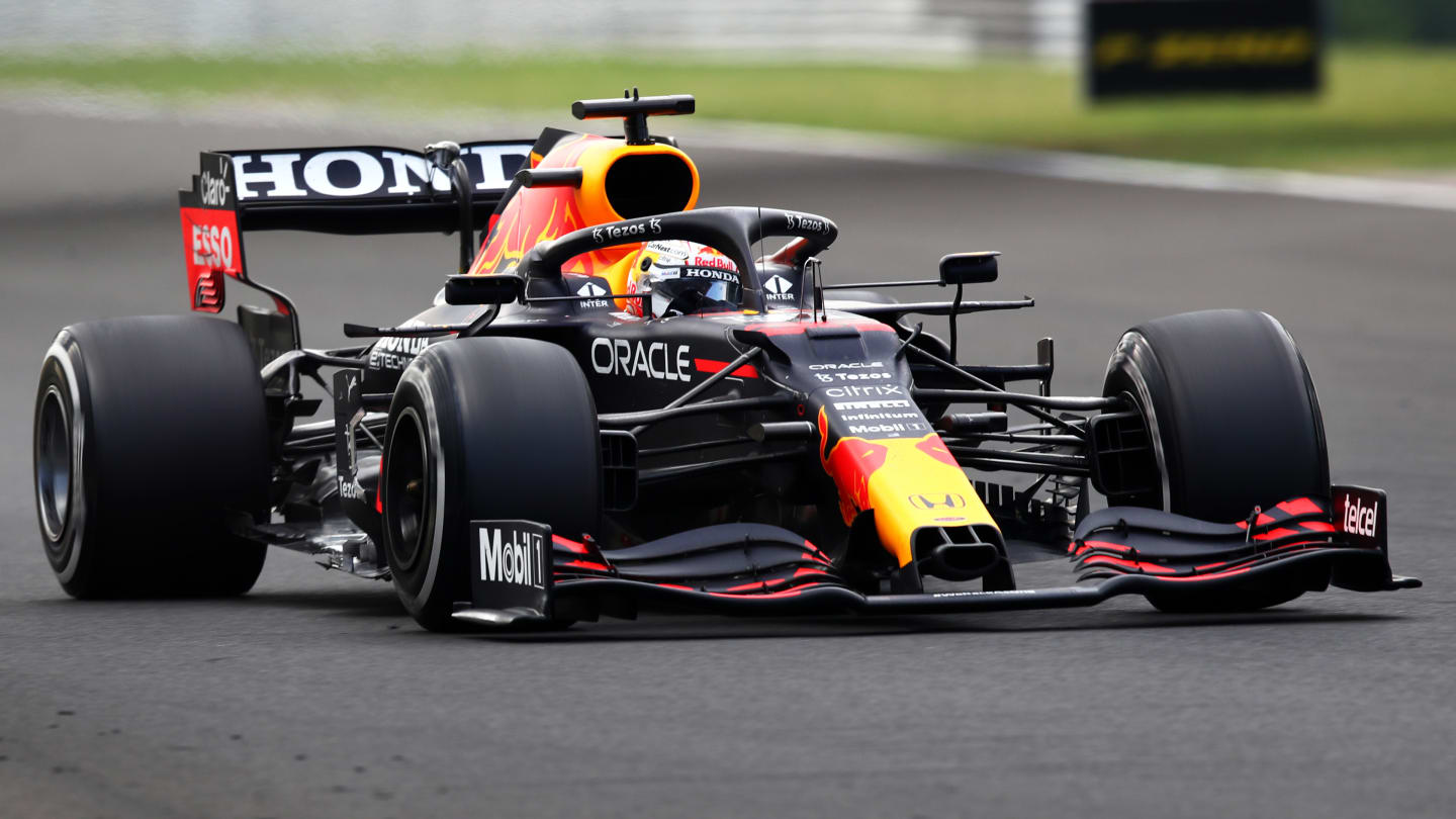 BUDAPEST, HUNGARY - AUGUST 01: Max Verstappen of the Netherlands driving the (33) Red Bull Racing