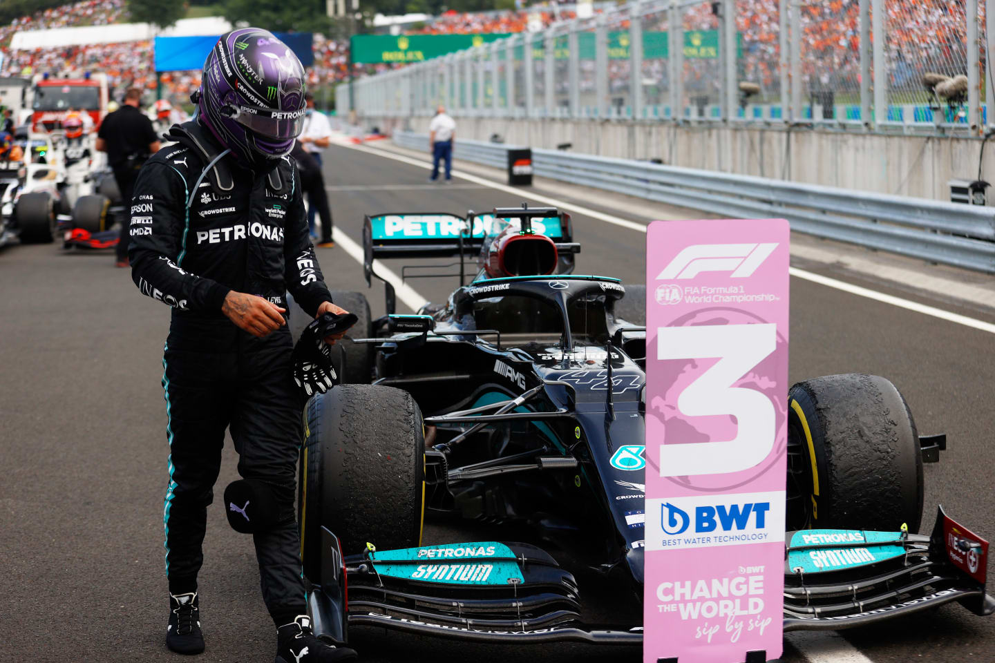 BUDAPEST, HUNGARY - AUGUST 01: Third placed Lewis Hamilton of Great Britain and Mercedes GP walks from his car in parc ferme during the F1 Grand Prix of Hungary at Hungaroring on August 01, 2021 in Budapest, Hungary. (Photo by Florion Goga - Pool/Getty Images)