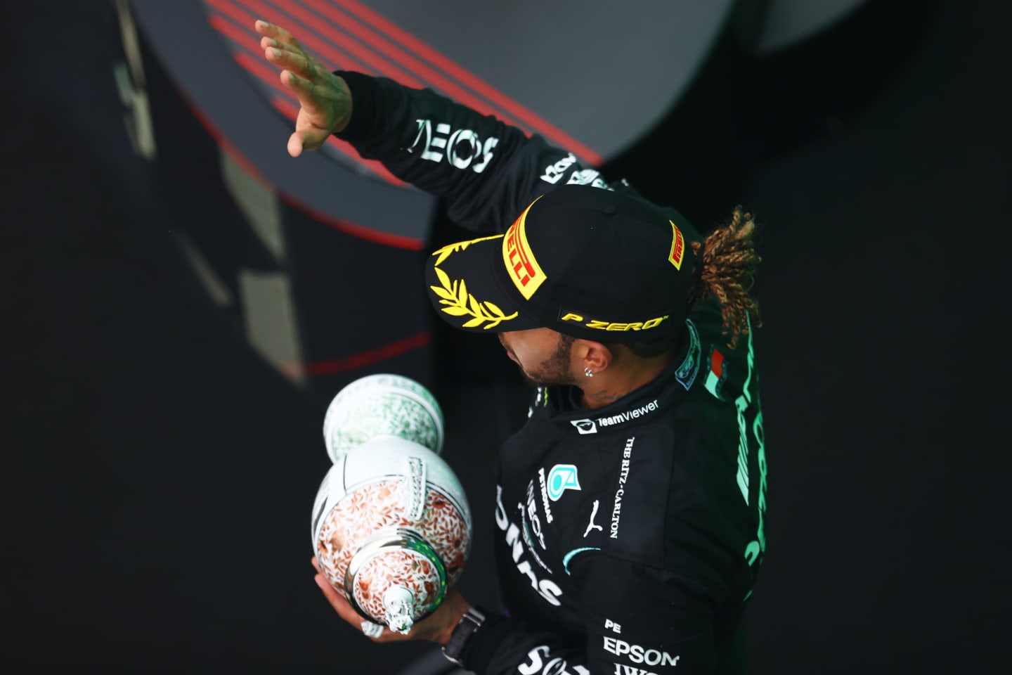 BUDAPEST, HUNGARY - AUGUST 01: Third placed Lewis Hamilton of Great Britain and Mercedes GP celebrates on the podium during the F1 Grand Prix of Hungary at Hungaroring on August 01, 2021 in Budapest, Hungary. (Photo by Bryn Lennon/Getty Images)
