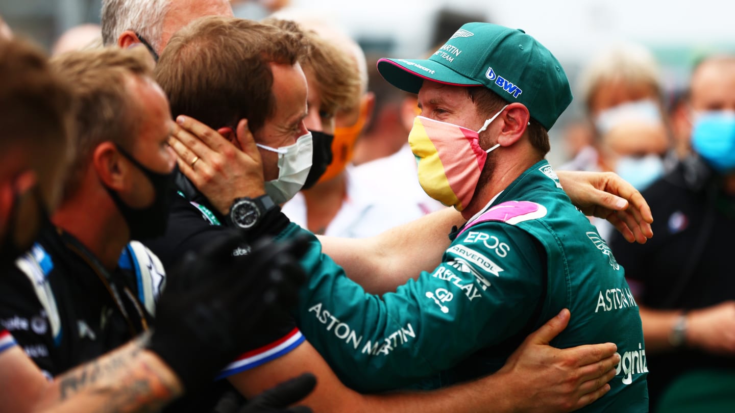 BUDAPEST, HUNGARY - AUGUST 01: Second placed Sebastian Vettel of Germany and Aston Martin F1 Team celebrates with his team in parc ferme during the F1 Grand Prix of Hungary at Hungaroring on August 01, 2021 in Budapest, Hungary. (Photo by Dan Istitene - Formula 1/Formula 1 via Getty Images)