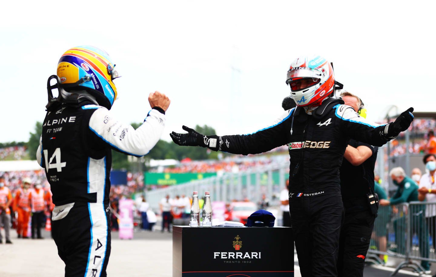BUDAPEST, HUNGARY - AUGUST 01: Race winner Esteban Ocon of France and Alpine F1 Team and fifth placed Fernando Alonso of Spain and Alpine F1 Team celebrate in parc ferme during the F1 Grand Prix of Hungary at Hungaroring on August 01, 2021 in Budapest, Hungary. (Photo by Dan Istitene - Formula 1/Formula 1 via Getty Images)