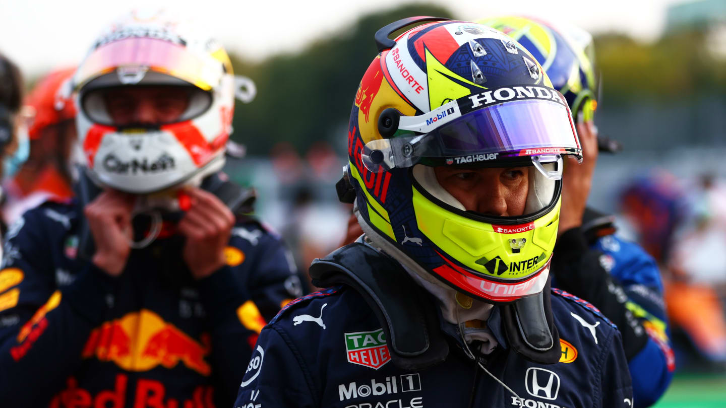 MONZA, ITALY - SEPTEMBER 10: Sergio Perez of Mexico and Red Bull Racing walks in parc ferme during