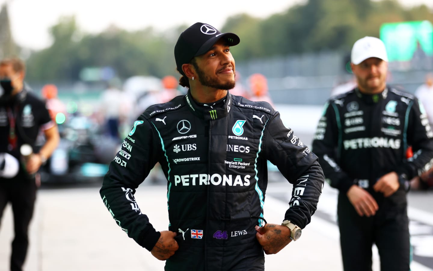 MONZA, ITALY - SEPTEMBER 10: Second place qualifier Lewis Hamilton of Great Britain and Mercedes GP looks on in parc ferme during qualifying ahead of the F1 Grand Prix of Italy at Autodromo di Monza on September 10, 2021 in Monza, Italy. (Photo by Bryn Lennon/Getty Images)