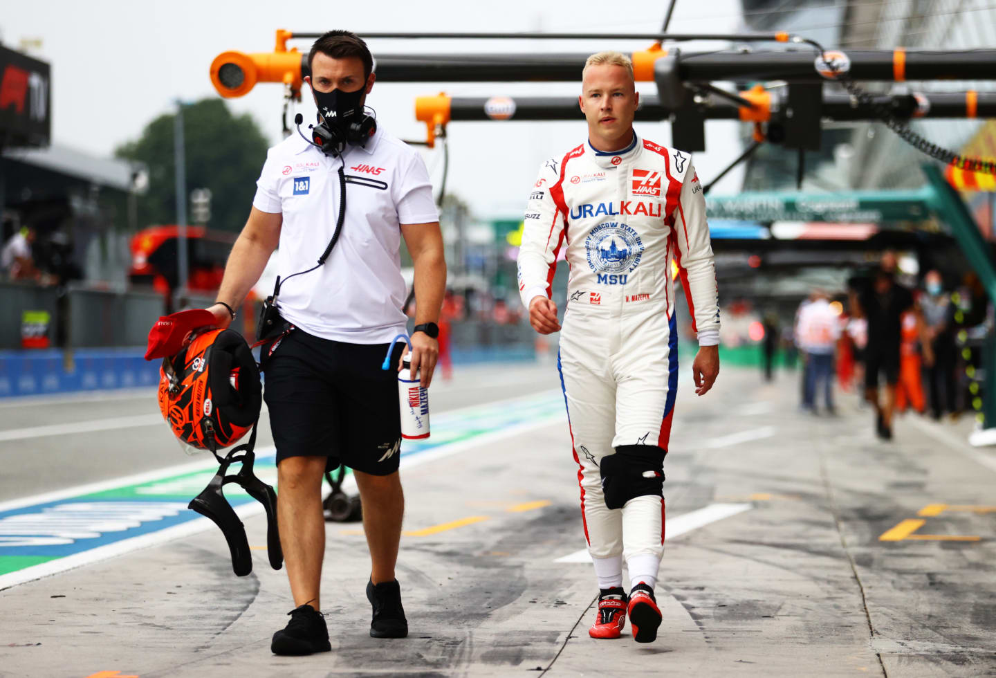 MONZA, ITALY - SEPTEMBER 10: Nikita Mazepin of Russia and Haas F1 walks in the Pitlane during qualifying ahead of the F1 Grand Prix of Italy at Autodromo di Monza on September 10, 2021 in Monza, Italy. (Photo by Bryn Lennon/Getty Images)
