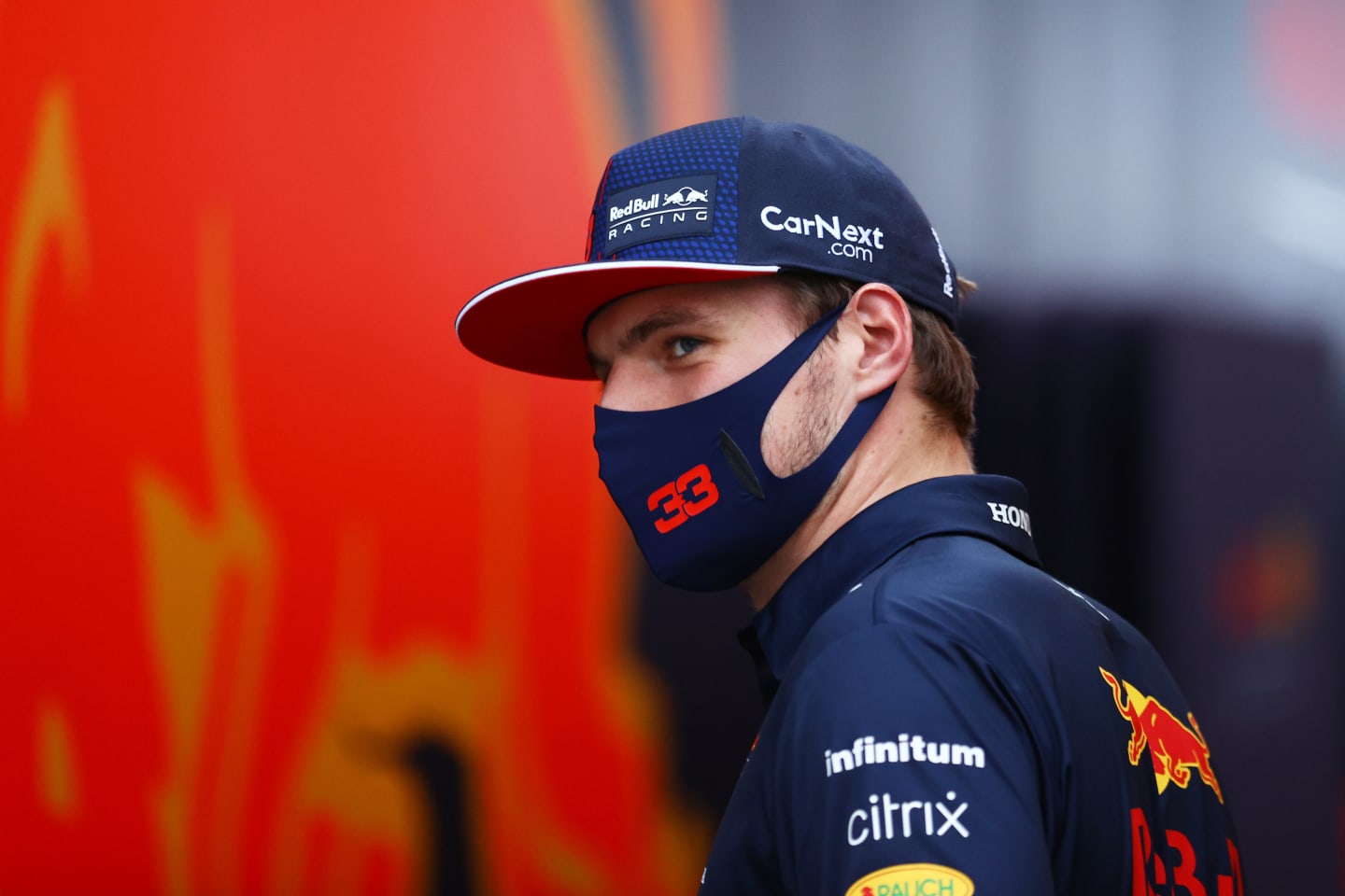 MONZA, ITALY - SEPTEMBER 10: Max Verstappen of Netherlands and Red Bull Racing looks on in the Paddock after qualifying ahead of the F1 Grand Prix of Italy at Autodromo di Monza on September 10, 2021 in Monza, Italy. (Photo by Bryn Lennon/Getty Images)