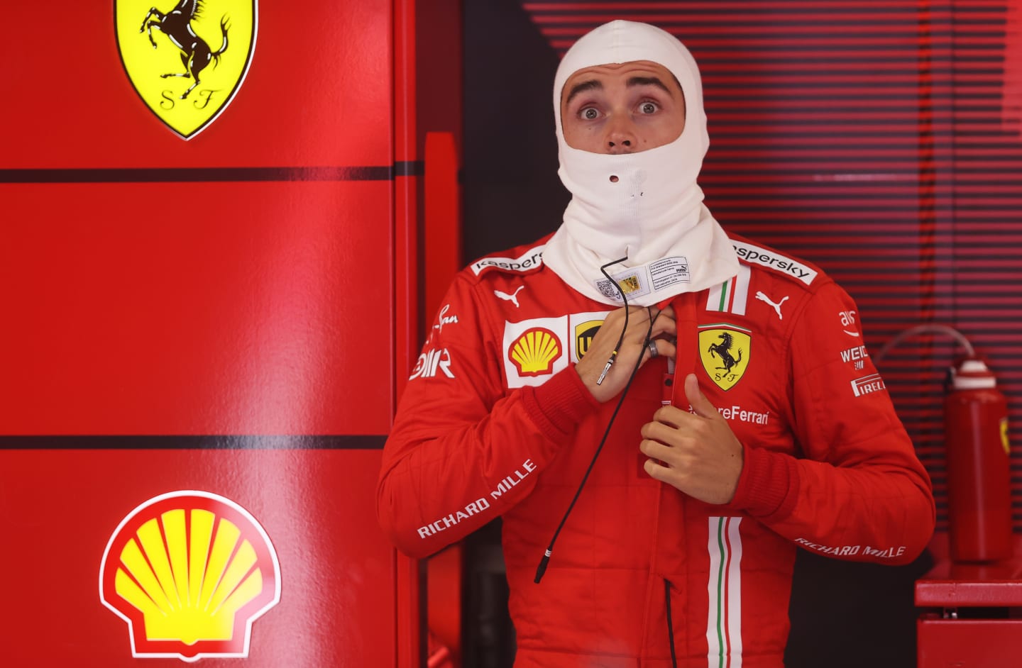 MONZA, ITALY - SEPTEMBER 11: Charles Leclerc of Monaco and Ferrari prepares to drive in the garage prior to the Sprint ahead of the F1 Grand Prix of Italy at Autodromo di Monza on September 11, 2021 in Monza, Italy. (Photo by Lars Baron/Getty Images)