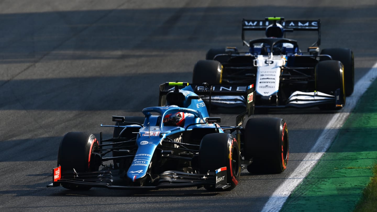 MONZA, ITALY - SEPTEMBER 11: Esteban Ocon of France driving the (31) Alpine A521 Renault leads Nicholas Latifi of Canada driving the (6) Williams Racing FW43B Mercedes during the Sprint ahead of the F1 Grand Prix of Italy at Autodromo di Monza on September 11, 2021 in Monza, Italy. (Photo by Clive Mason - Formula 1/Formula 1 via Getty Images)
