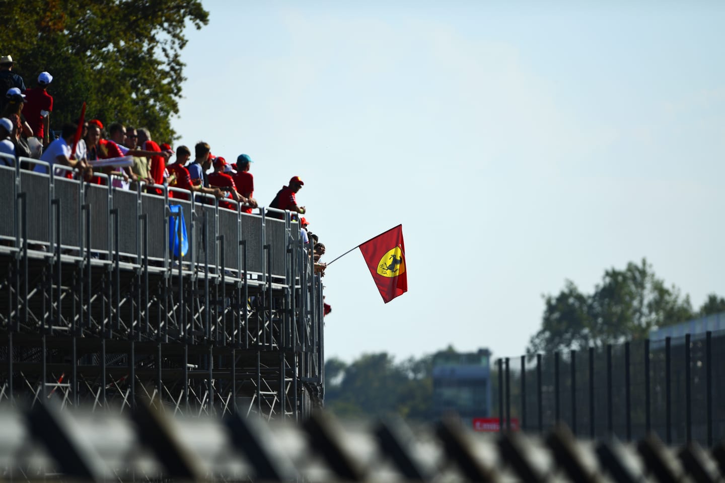 MONZA, ITALY - SEPTEMBER 12: Ferrari fans show their support during the F1 Grand Prix of Italy at Autodromo di Monza on September 12, 2021 in Monza, Italy. (Photo by Rudy Carezzevoli/Getty Images)