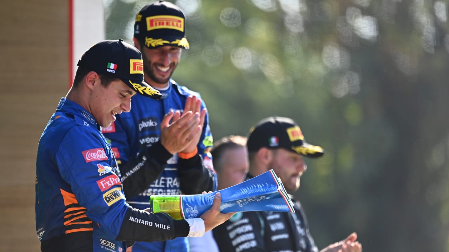 MONZA, ITALY - SEPTEMBER 12: Second placed Lando Norris of Great Britain and McLaren F1 celebrates on the podium during the F1 Grand Prix of Italy at Autodromo di Monza on September 12, 2021 in Monza, Italy. (Photo by Clive Mason - Formula 1/Formula 1 via Getty Images)