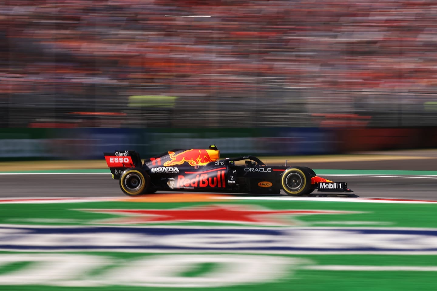 MONZA, ITALY - SEPTEMBER 12: Sergio Perez of Mexico driving the (11) Red Bull Racing RB16B Honda during the F1 Grand Prix of Italy at Autodromo di Monza on September 12, 2021 in Monza, Italy. (Photo by Lars Baron/Getty Images)
