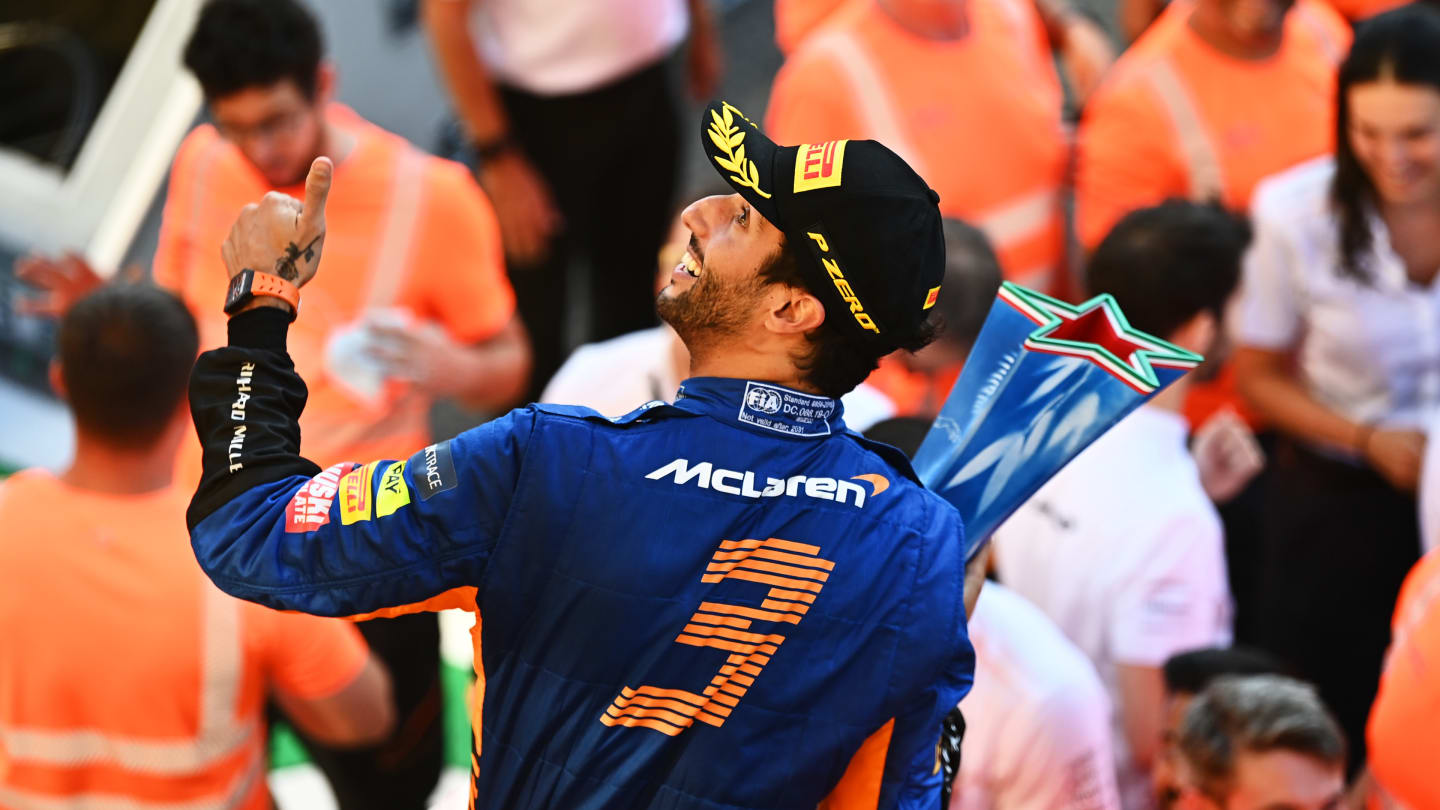 MONZA, ITALY - SEPTEMBER 12: Race winner Daniel Ricciardo of Australia and McLaren F1 celebrates with his team after the F1 Grand Prix of Italy at Autodromo di Monza on September 12, 2021 in Monza, Italy. (Photo by Clive Mason - Formula 1/Formula 1 via Getty Images)