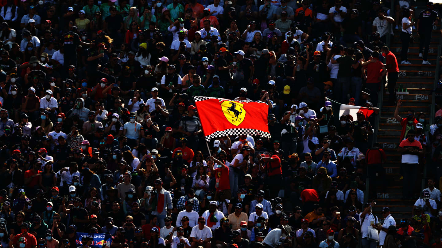 MEXICO CITY, MEXICO - NOVEMBER 06: Ferrari fans show their support during qualifying ahead of the F1 Grand Prix of Mexico at Autodromo Hermanos Rodriguez on November 06, 2021 in Mexico City, Mexico. (Photo by Bryn Lennon - Formula 1/Formula 1 via Getty Images)