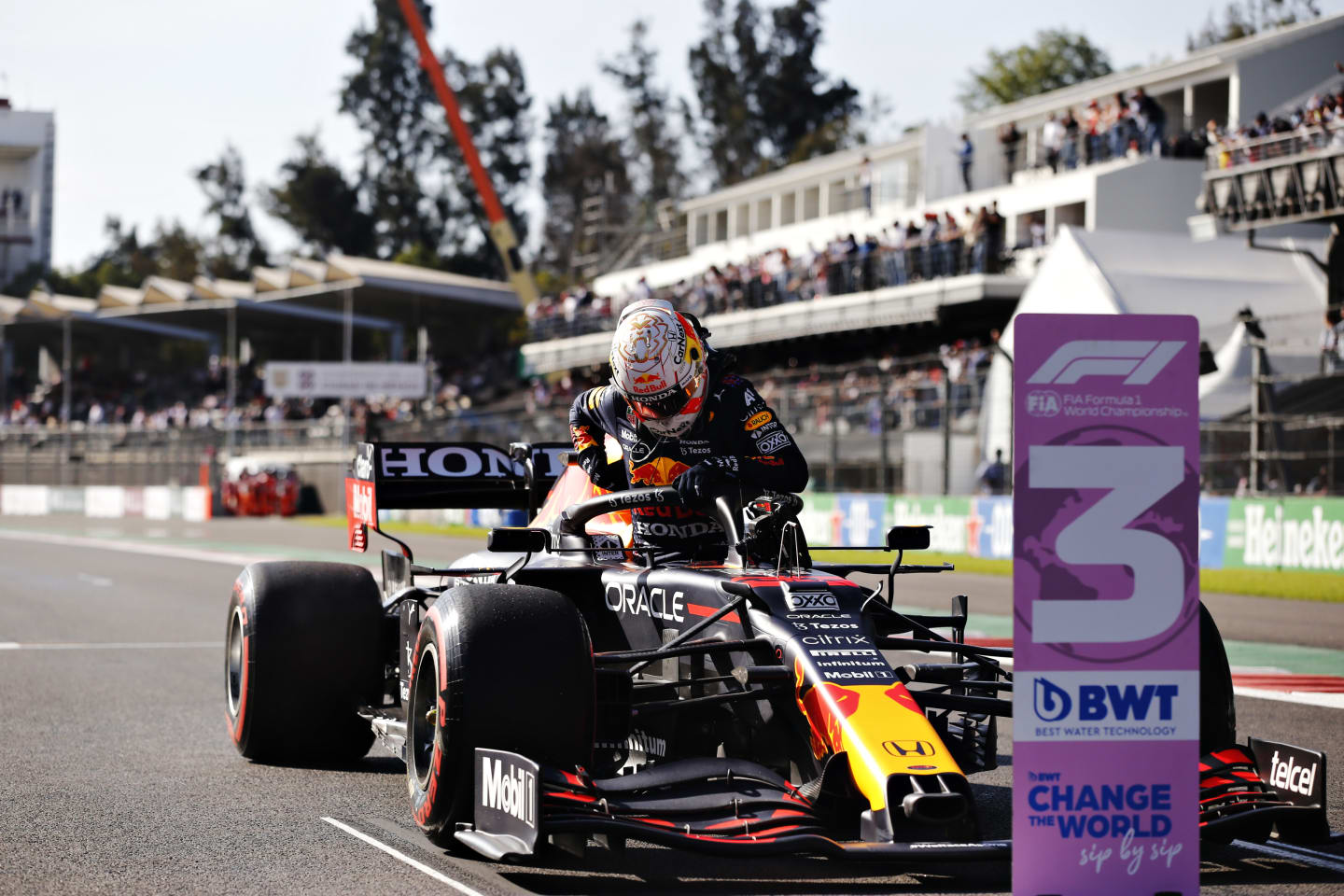 MEXICO CITY, MEXICO - NOVEMBER 06: Third place qualifier Max Verstappen of Netherlands and Red Bull Racing climbs from his car in parc ferme during qualifying ahead of the F1 Grand Prix of Mexico at Autodromo Hermanos Rodriguez on November 06, 2021 in Mexico City, Mexico. (Photo by Francisco Guasco - Pool/Getty Images)