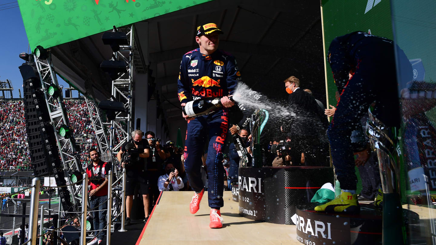 MEXICO CITY, MEXICO - NOVEMBER 07: Race winner Max Verstappen of Netherlands and Red Bull Racing celebrates on the podium during the F1 Grand Prix of Mexico at Autodromo Hermanos Rodriguez on November 07, 2021 in Mexico City, Mexico. (Photo by Mario Renzi - Formula 1/Formula 1 via Getty Images)