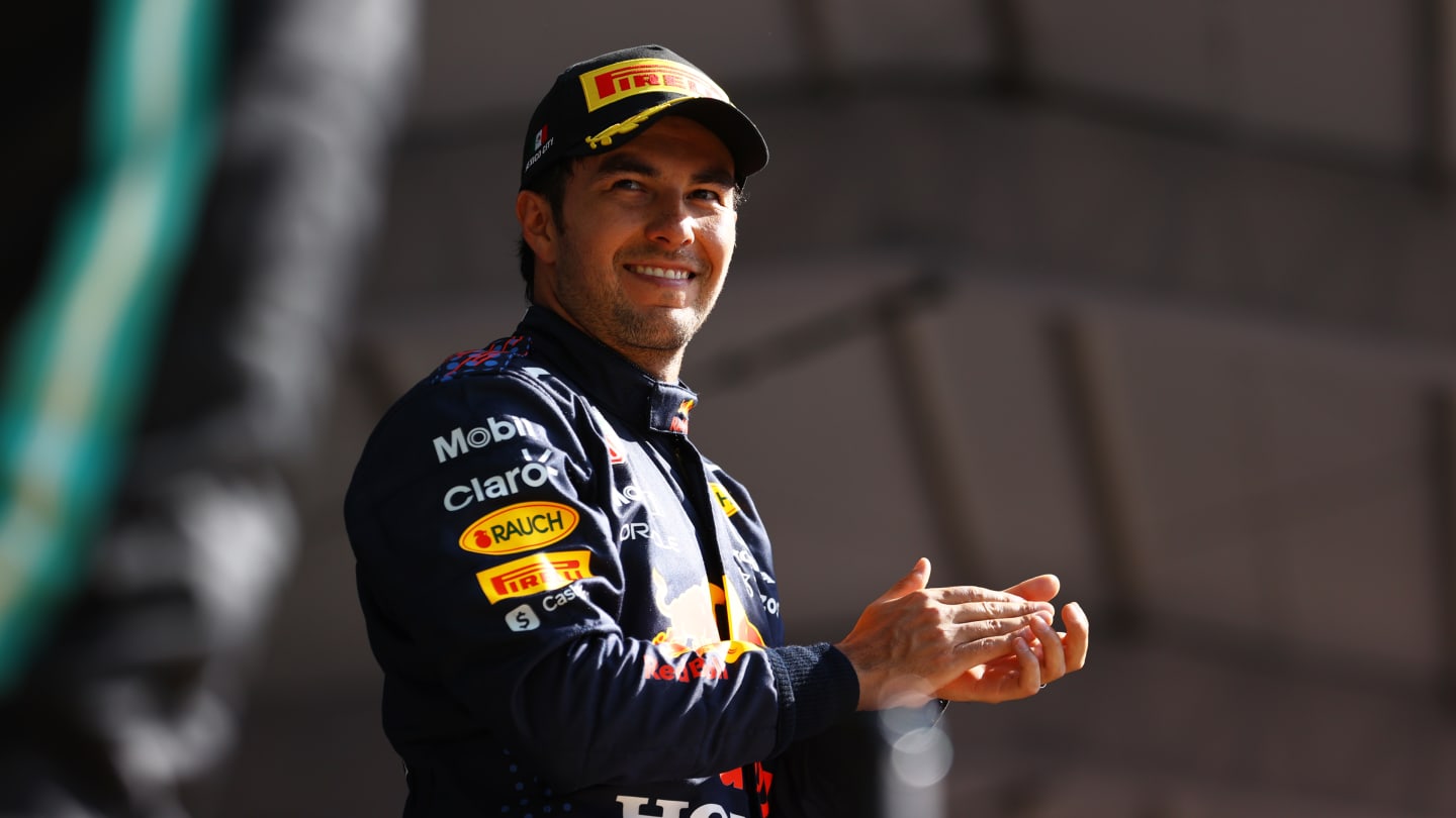 MEXICO CITY, MEXICO - NOVEMBER 07: Third placed Sergio Perez of Mexico and Red Bull Racing celebrates on the podium during the F1 Grand Prix of Mexico at Autodromo Hermanos Rodriguez on November 07, 2021 in Mexico City, Mexico. (Photo by Bryn Lennon - Formula 1/Formula 1 via Getty Images)