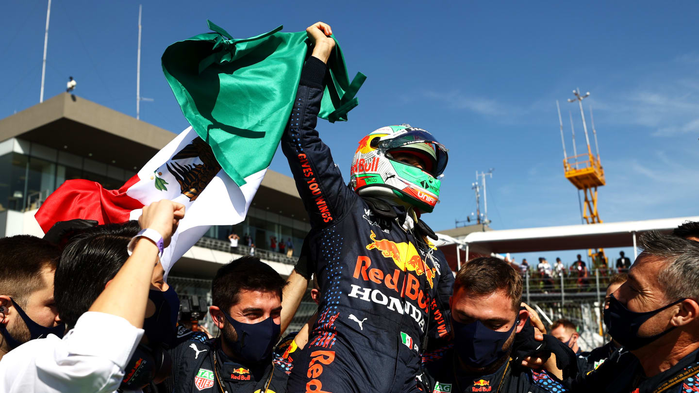 MEXICO CITY, MEXICO - NOVEMBER 07: Third placed Sergio Perez of Mexico and Red Bull Racing