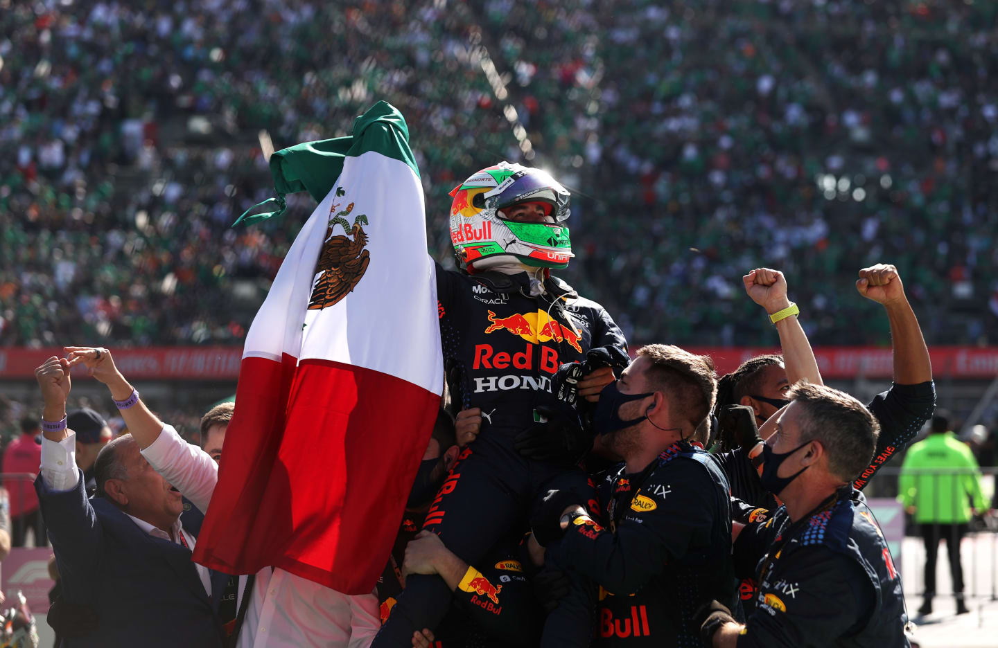 MEXICO CITY, MEXICO - NOVEMBER 07: Third placed Sergio Perez of Mexico and Red Bull Racing