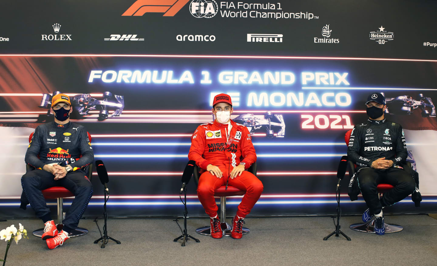 MONTE-CARLO, MONACO - MAY 22: Second placed qualifier Max Verstappen of Netherlands and Red Bull Racing, pole position qualifier Charles Leclerc of Monaco and Ferrari and third placed qualifier Valtteri Bottas of Finland and Mercedes GP talk during a Press Conference after qualifying prior to the F1 Grand Prix of Monaco at Circuit de Monaco on May 22, 2021 in Monte-Carlo, Monaco. (Photo by Zak Mauger - Pool/Getty Images)