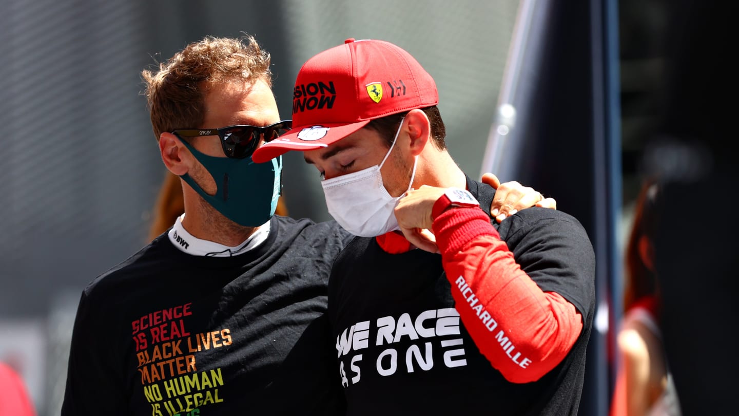 MONTE-CARLO, MONACO - MAY 23: Charles Leclerc of Monaco and Ferrari is comforted by Sebastian Vettel of Germany and Aston Martin F1 Team after discovering he could not start the race during the F1 Grand Prix of Monaco at Circuit de Monaco on May 23, 2021 in Monte-Carlo, Monaco. (Photo by Dan Istitene - Formula 1/Formula 1 via Getty Images)