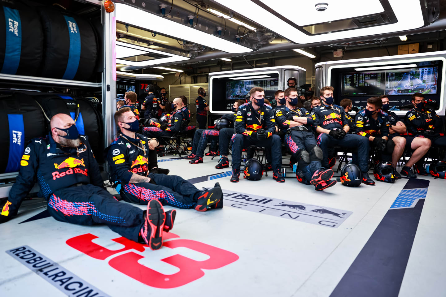 MONTE-CARLO, MONACO - MAY 23: Red Bull Racing team members watch the action in the garage during
