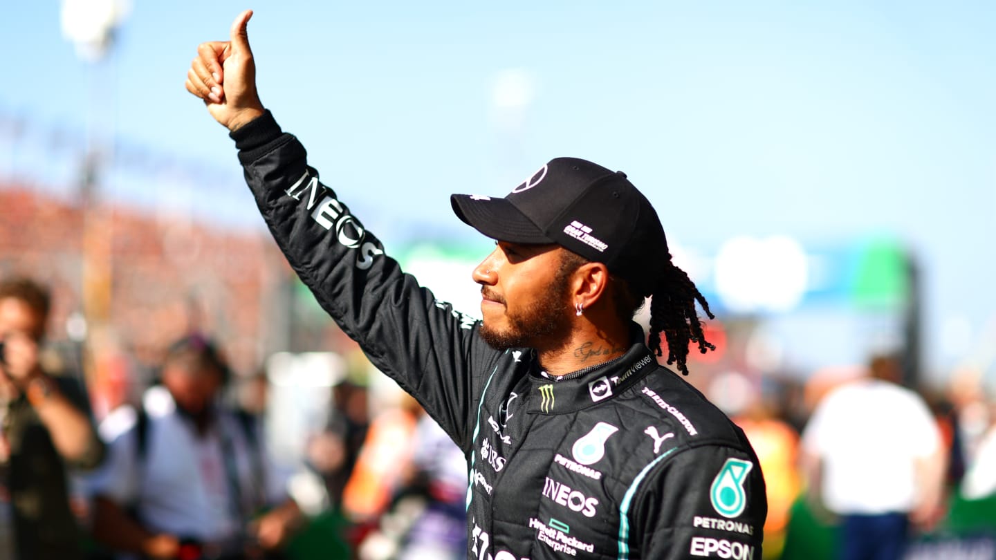 ZANDVOORT, NETHERLANDS - SEPTEMBER 04: Second place qualifier Lewis Hamilton of Great Britain and Mercedes GP waves to the crowd from parc ferme during qualifying ahead of the F1 Grand Prix of The Netherlands at Circuit Zandvoort on September 04, 2021 in Zandvoort, Netherlands. (Photo by Dan Istitene - Formula 1/Formula 1 via Getty Images)