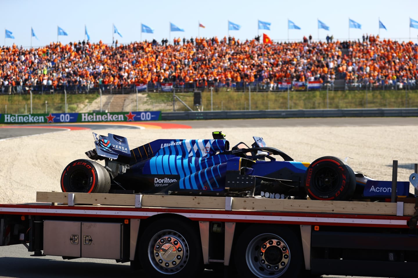 ZANDVOORT, NETHERLANDS - SEPTEMBER 04: The broken car of Nicholas Latifi of Canada and Williams is returned to the pits during qualifying ahead of the F1 Grand Prix of The Netherlands at Circuit Zandvoort on September 04, 2021 in Zandvoort, Netherlands. (Photo by Bryn Lennon/Getty Images)