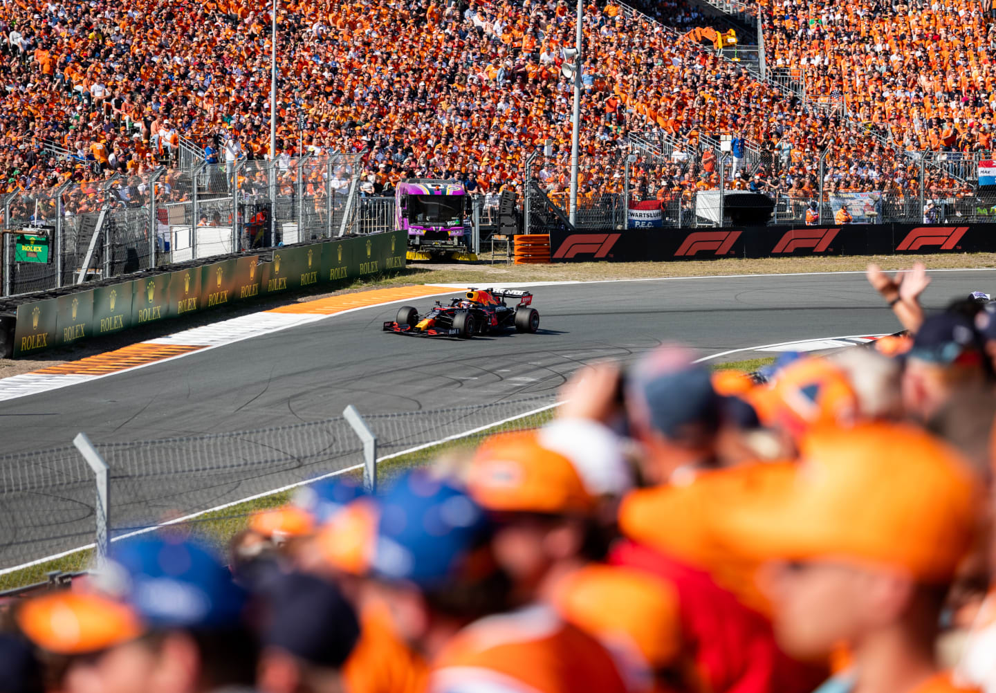 ZANDVOORT, NETHERLANDS - SEPTEMBER 05: Fans celebrate Max Verstappen of the Netherlands driving the