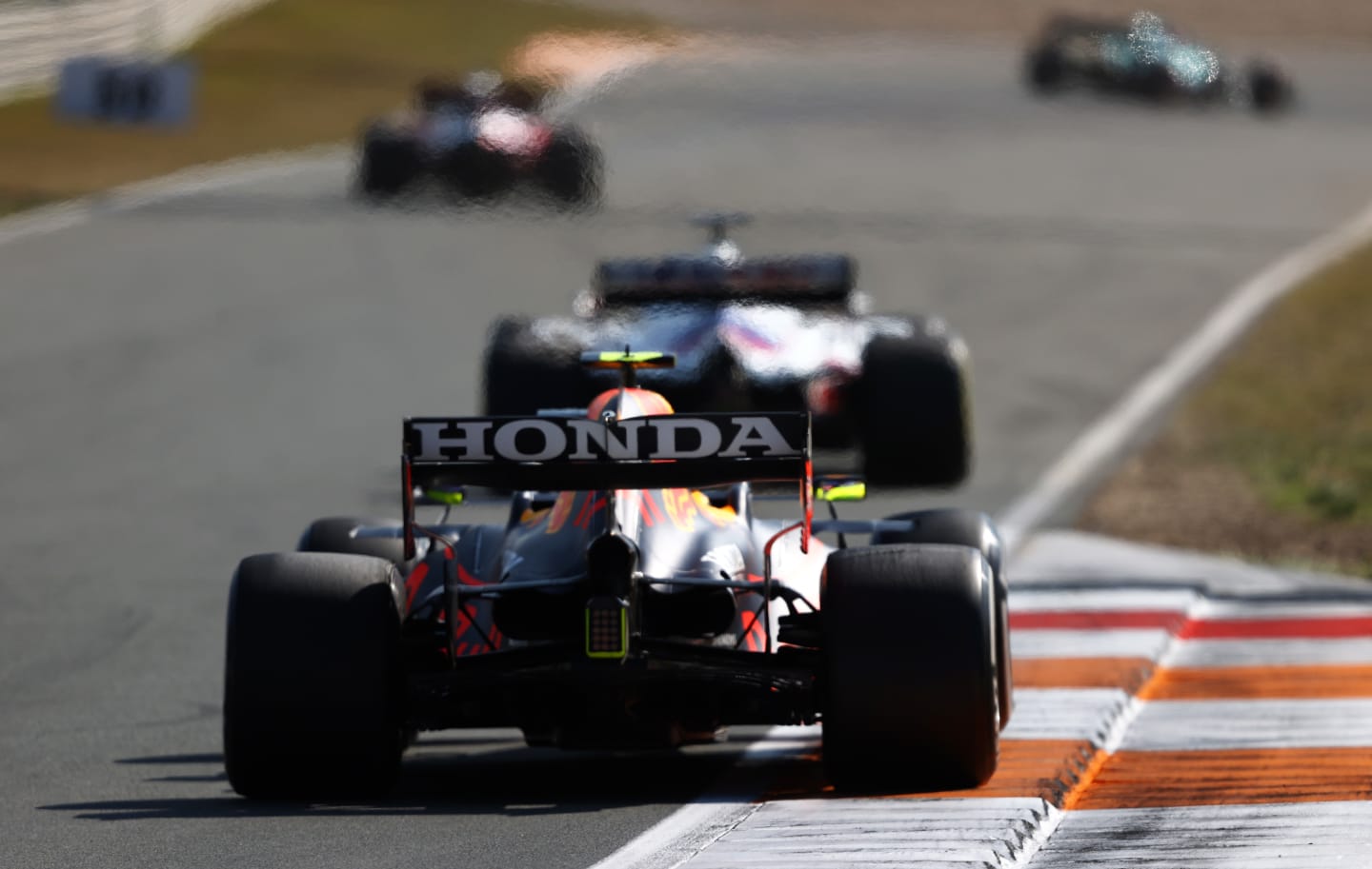 ZANDVOORT, NETHERLANDS - SEPTEMBER 05: Sergio Perez of Mexico driving the (11) Red Bull Racing RB16B Honda during the F1 Grand Prix of The Netherlands at Circuit Zandvoort on September 05, 2021 in Zandvoort, Netherlands. (Photo by Bryn Lennon/Getty Images)