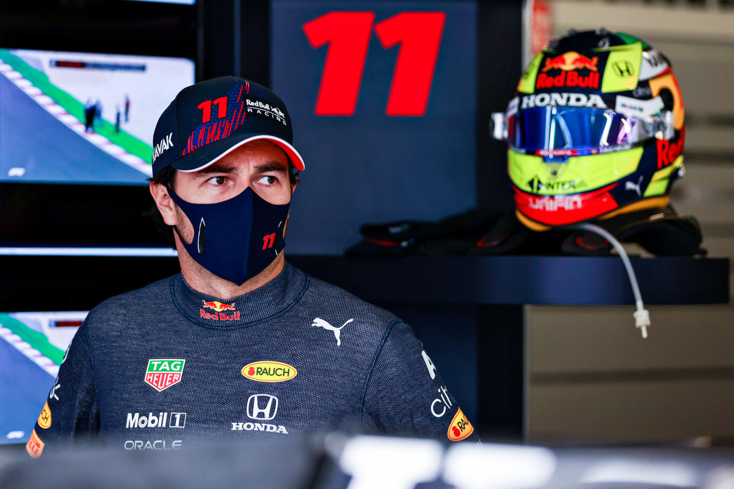 PORTIMAO, PORTUGAL - APRIL 30: Sergio Perez of Mexico and Red Bull Racing prepares to drive in the garage during practice ahead of the F1 Grand Prix of Portugal at Autodromo Internacional Do Algarve on April 30, 2021 in Portimao, Portugal. (Photo by Mark Thompson/Getty Images)