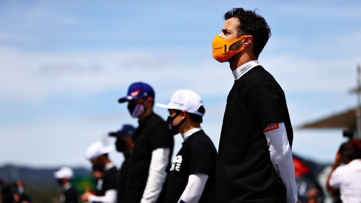 PORTIMAO, PORTUGAL - MAY 02: Daniel Ricciardo of Australia and McLaren F1 stands for the national anthem prior to the F1 Grand Prix of Portugal at Autodromo Internacional Do Algarve on May 02, 2021 in Portimao, Portugal. (Photo by Dan Istitene - Formula 1/Formula 1 via Getty Images)