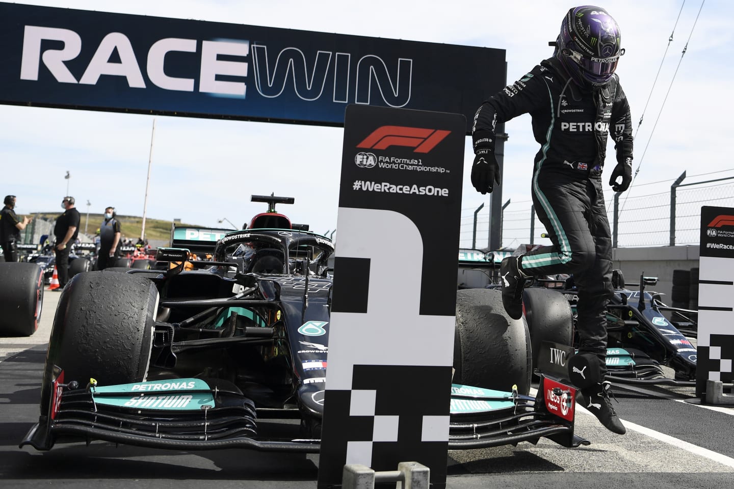 PORTIMAO, PORTUGAL - MAY 02: Race winner Lewis Hamilton of Great Britain and Mercedes GP celebrates in parc ferme after the F1 Grand Prix of Portugal at Autodromo Internacional Do Algarve on May 02, 2021 in Portimao, Portugal. (Photo by Gabriel Bouys - Pool/Getty Images)
