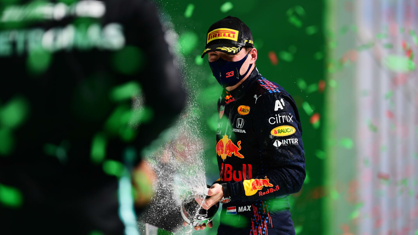 PORTIMAO, PORTUGAL - MAY 02: Second placed Max Verstappen of Netherlands and Red Bull Racing celebrates with sparkling wine on the podium during the F1 Grand Prix of Portugal at Autodromo Internacional Do Algarve on May 02, 2021 in Portimao, Portugal. (Photo by Mario Renzi - Formula 1/Formula 1 via Getty Images)