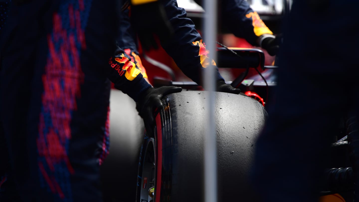 PORTIMAO, PORTUGAL - MAY 02: A Red Bull team member prepares the tyres during the F1 Grand Prix of