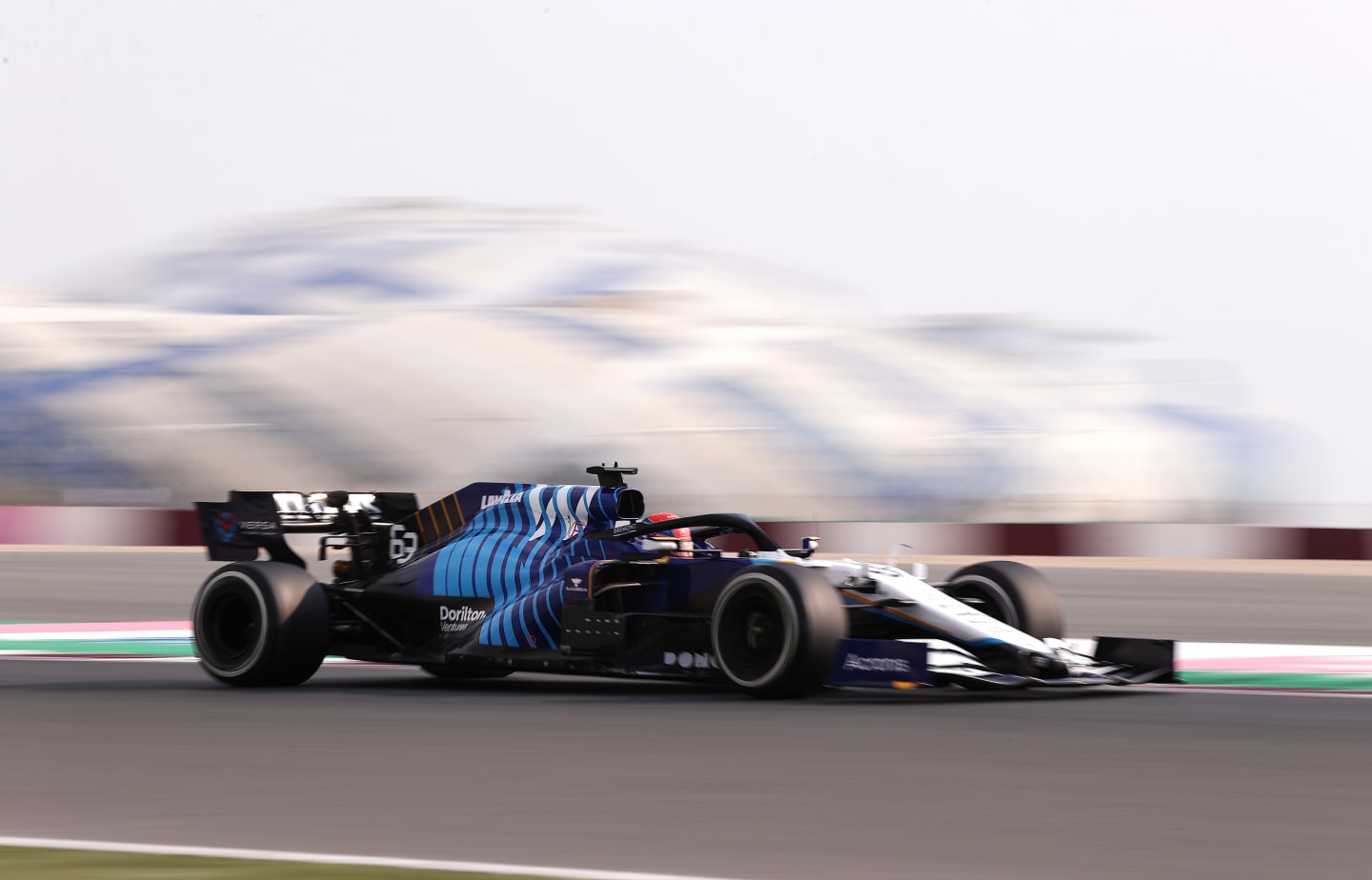 DOHA, QATAR - NOVEMBER 19: George Russell of Great Britain driving the (63) Williams Racing FW43B Mercedes during practice ahead of the F1 Grand Prix of Qatar at Losail International Circuit on November 19, 2021 in Doha, Qatar. (Photo by Lars Baron/Getty Images)