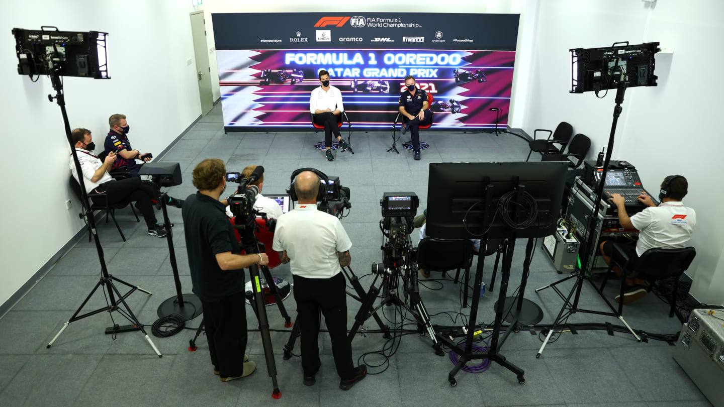 DOHA, QATAR - NOVEMBER 19: Mercedes GP Executive Director Toto Wolff and Red Bull Racing Team Principal Christian Horner talk in the Team Principals Press Conference during practice ahead of the F1 Grand Prix of Qatar at Losail International Circuit on November 19, 2021 in Doha, Qatar. (Photo by Dan Istitene/Getty Images)