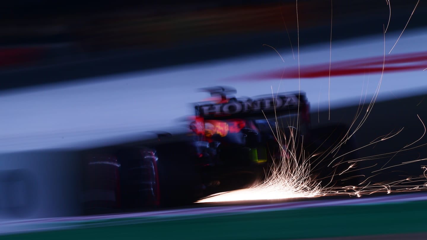 DOHA, QATAR - NOVEMBER 19: Sparks fly behind Max Verstappen of the Netherlands driving the (33) Red Bull Racing RB16B Honda during practice ahead of the F1 Grand Prix of Qatar at Losail International Circuit on November 19, 2021 in Doha, Qatar. (Photo by Mario Renzi - Formula 1/Formula 1 via Getty Images)