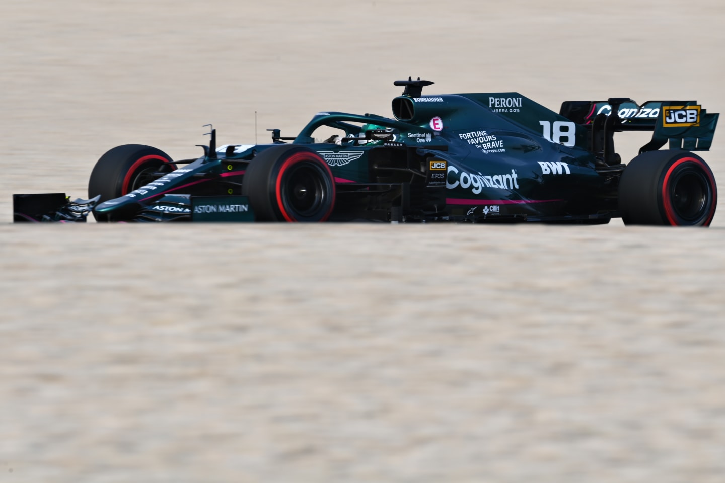 DOHA, QATAR - NOVEMBER 20: Lance Stroll of Canada driving the (18) Aston Martin AMR21 Mercedes during final practice ahead of the F1 Grand Prix of Qatar at Losail International Circuit on November 20, 2021 in Doha, Qatar. (Photo by Clive Mason/Getty Images)