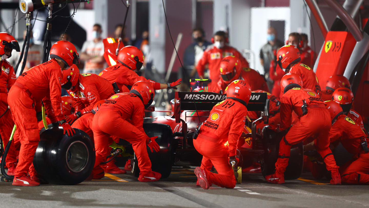 DOHA, QATAR - NOVEMBER 21: Carlos Sainz of Spain driving the (55) Scuderia Ferrari SF21 makes a