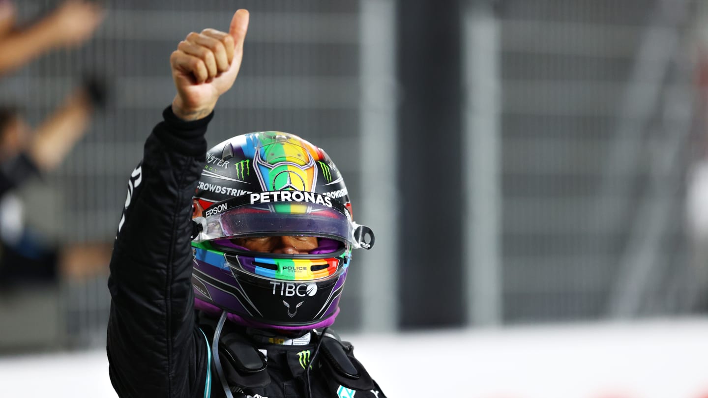 DOHA, QATAR - NOVEMBER 21: Race winner Lewis Hamilton of Great Britain and Mercedes GP celebrates